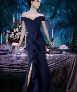 Janique - K6876 Off Shoulder Ruffle Slit Trumpet Gown